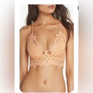 Free people Lace Bralette in Peach coral laced up top. Size ex/small